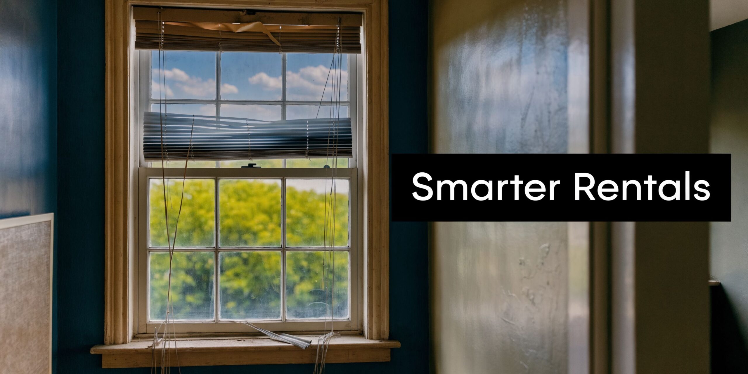 A view of a damaged window blind in a rental property against a background of trees.