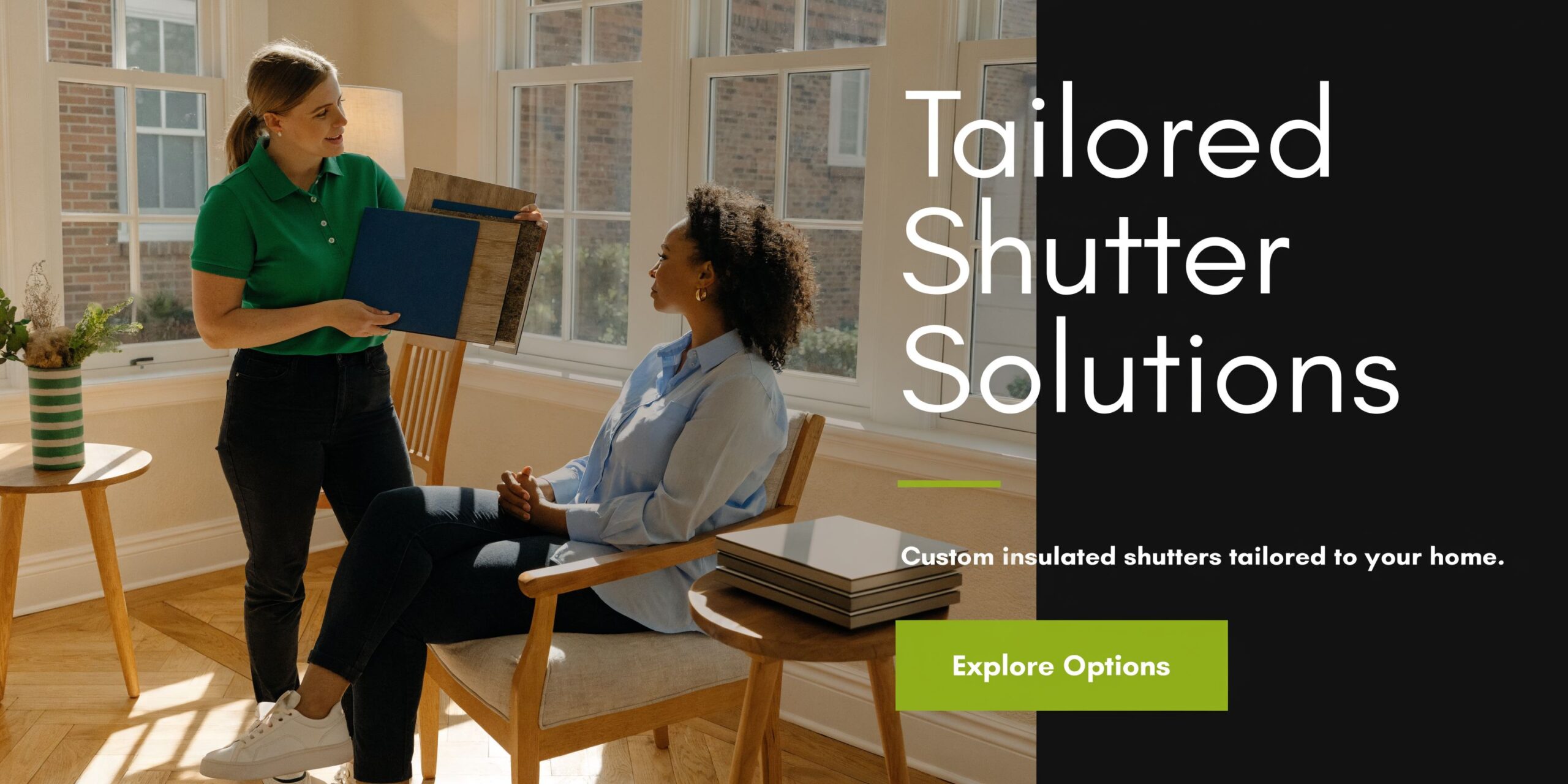 A professional interior design consultant showing window shutter samples to a customer in a bright sunlit room.