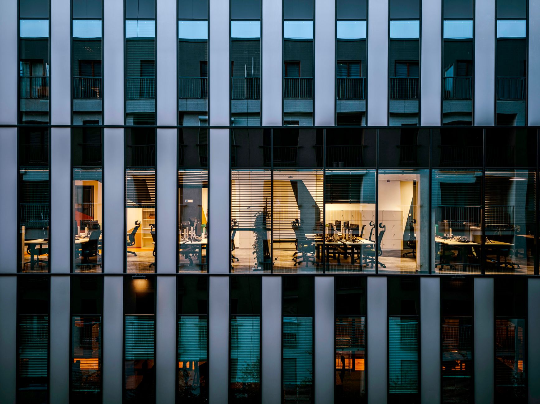 9. Panel Track Systems — Covering Large Commercial Windows with Style