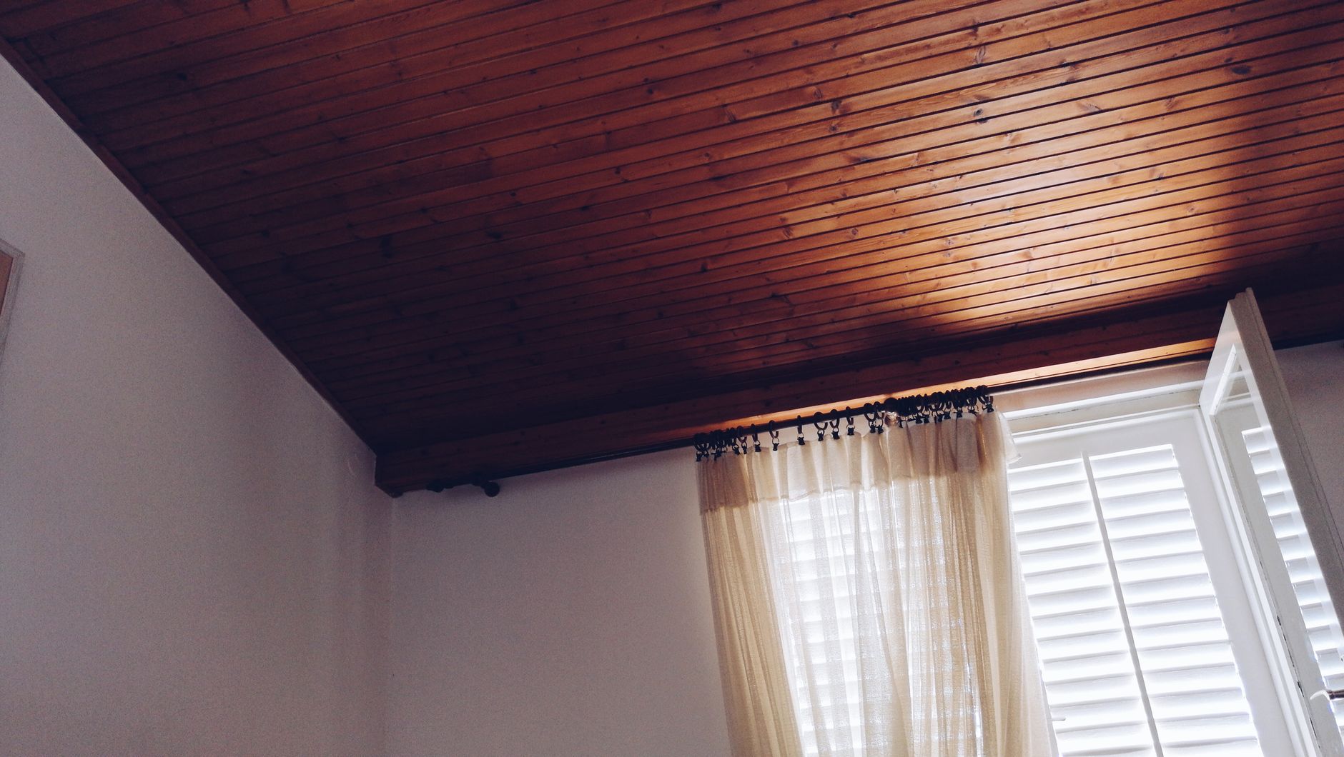6. Faux Wood Shutters — the Premium Option That Pays Off