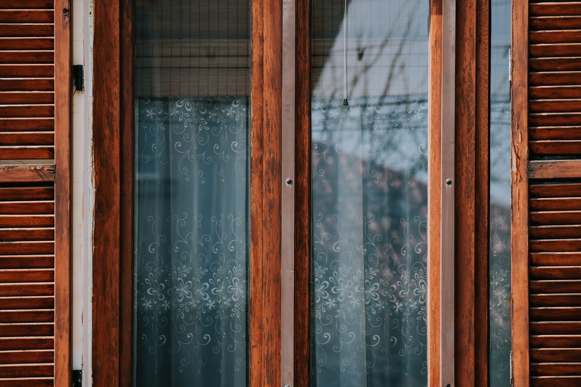 1. Faux Wood and Poly-Resin Shutters Won't Warp, Period